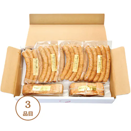 アイスター商事「夏の無塩せきハムセット」のお届けイメージ。商品外箱を開けた状態で、3品目の商品が見えるように表示しています。