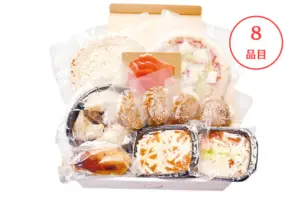 アイスター商事「パーティーセット2025」のお届けイメージ。 外箱を開けて、中の食材セットが見えるように撮影。