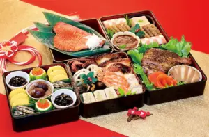 アイスター商事の定番おせち料理「なごやかセット白鳥2026」を重箱に盛り付けたイメージ画像